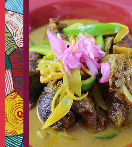 Typical dish of meat with green peppers on top