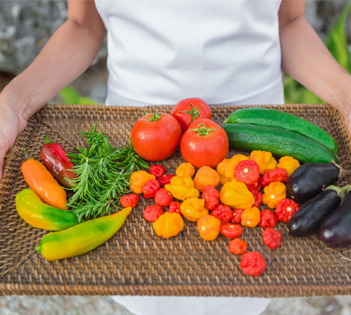 A selection of fresh herbs and vegetables