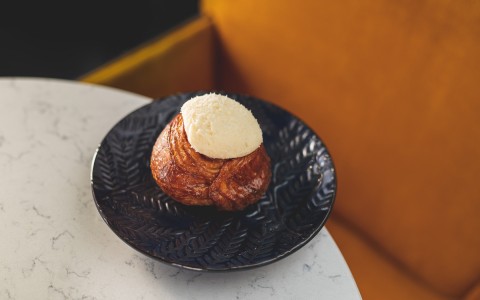 Cheese danish plated on a marble table