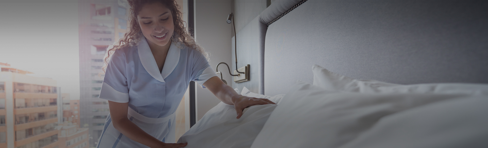 woman softening the pillows