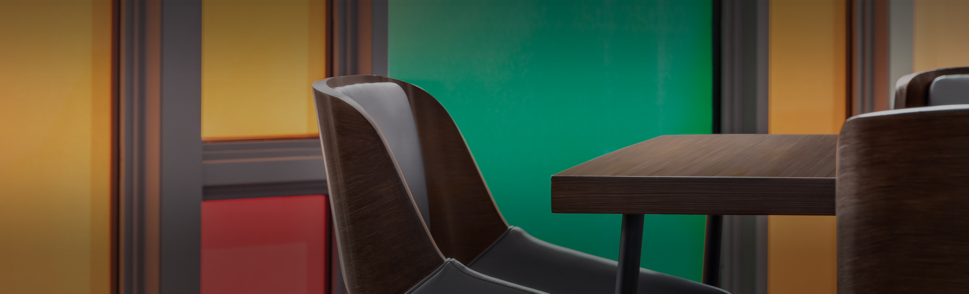 a chair and table next to the colorful entry