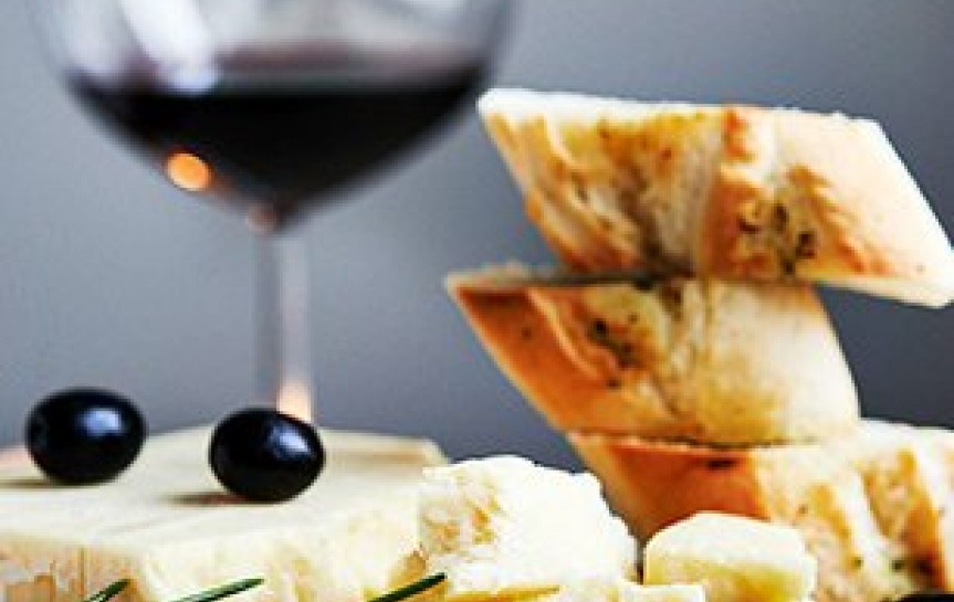 red wine, cheese, bread and olives