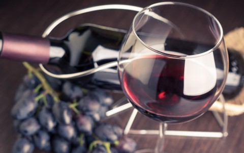 bottle and glass of red wine