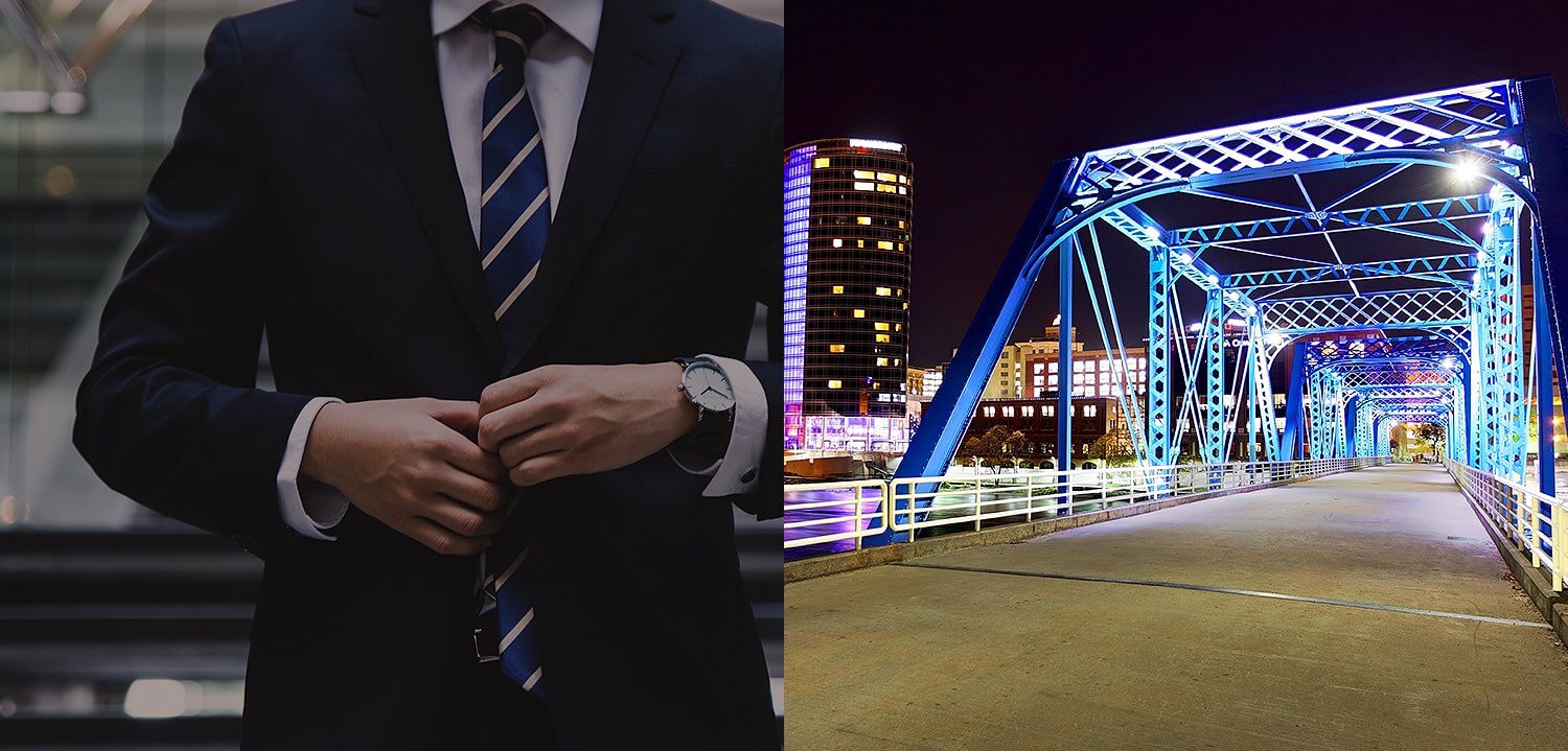 split image of a man buttoning his suit and a lit up bridge at night header