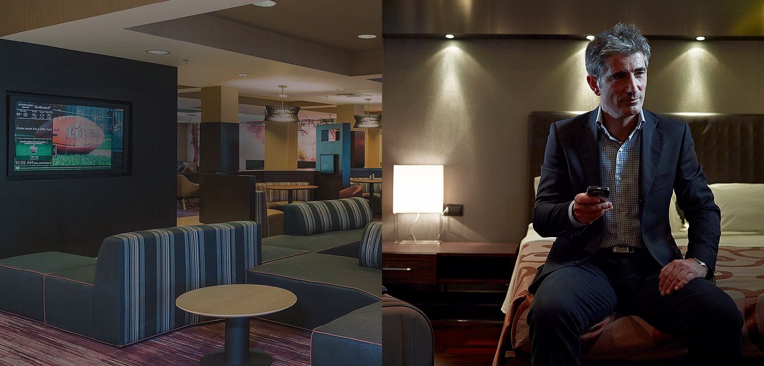 split image of a lobby with seating and tvs and a man sitting in a hotel room on the bed header