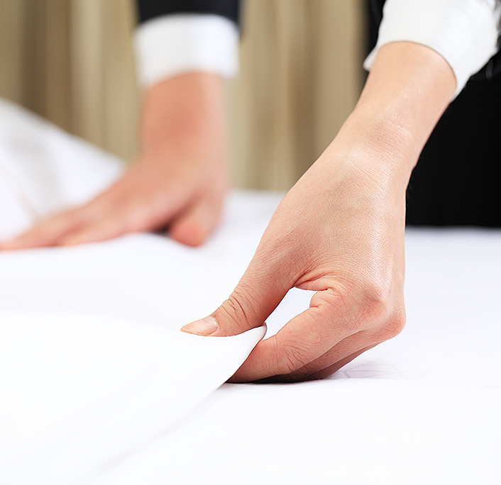 Close up of a hand stretching a blanket