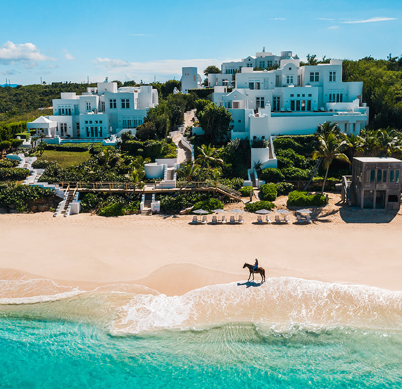 Aerial view of the full property next to the beach