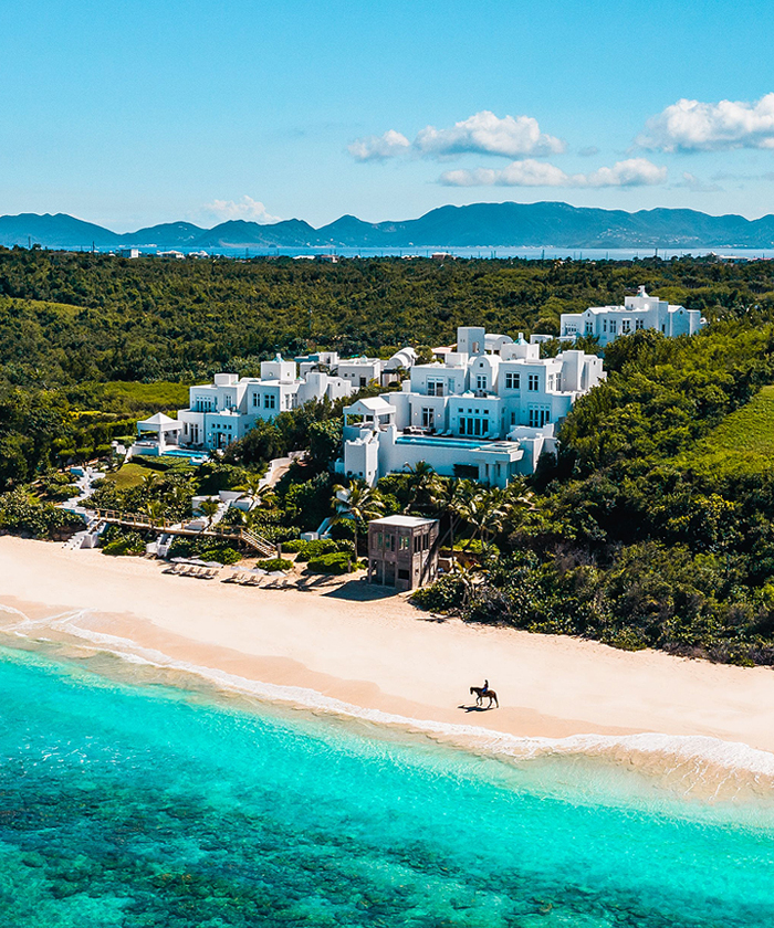 Aerial view of the full property next to the beach