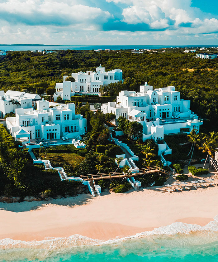 Aerial view of the full property next to the beach