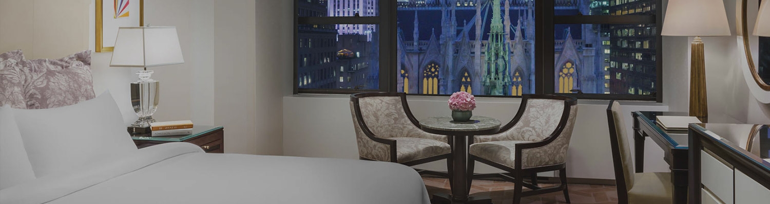 Palace King bed with nighttime Cathedral view
