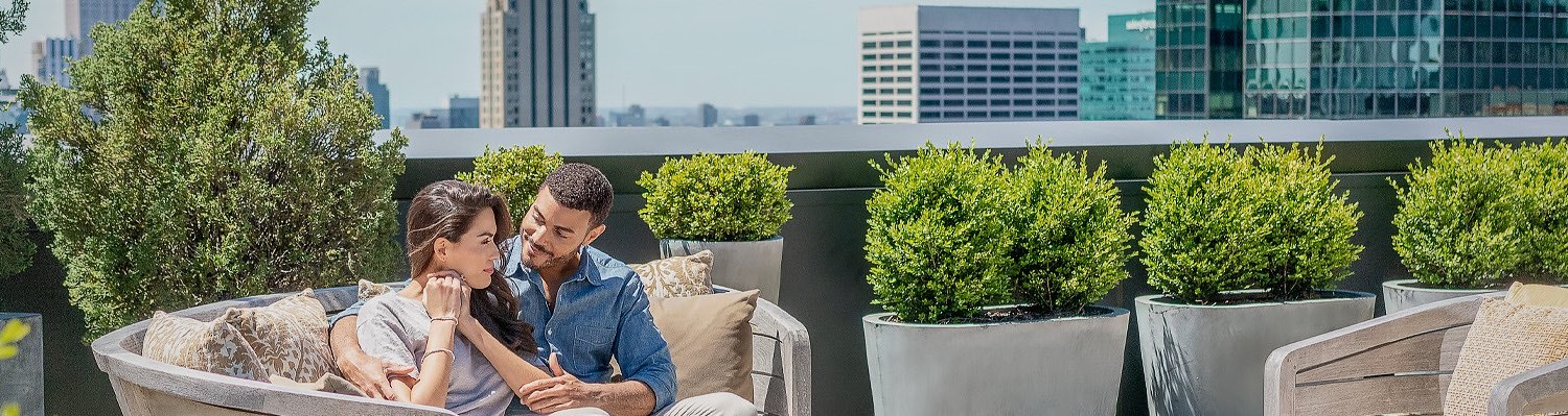 couple sitting on a terrace
