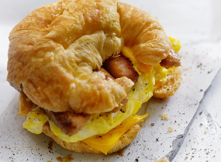 croissant sausage egg and cheese sandwich