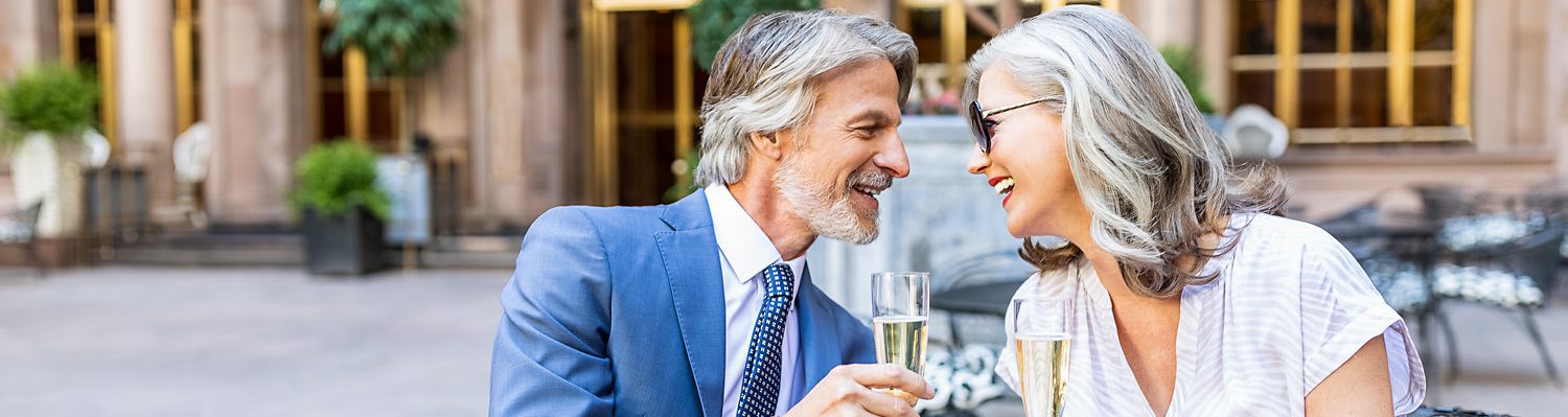 couple outside having champagne