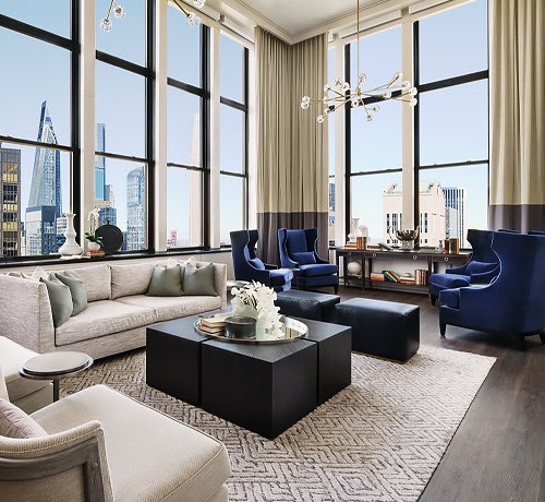 living area with daytime view of the city