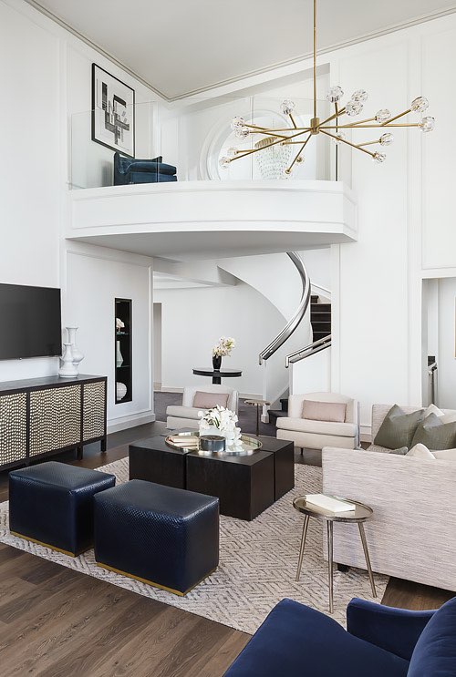 penthouse view of stairs and living area