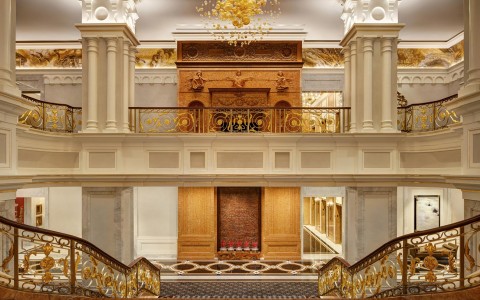 lobby staircases with golden accents
