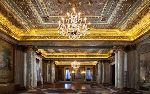 large event venue with multiple elegant chandeliers