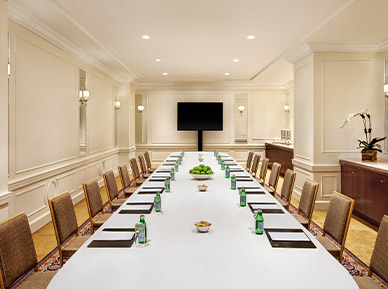 long rectangular board table with notebooks
