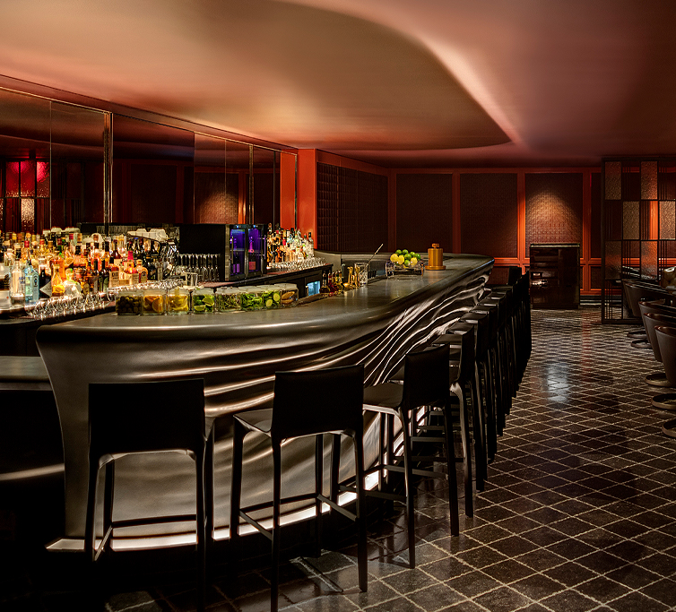 bar area in a dark lit room
