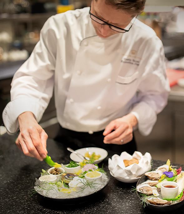 chef cedric preparing dishes