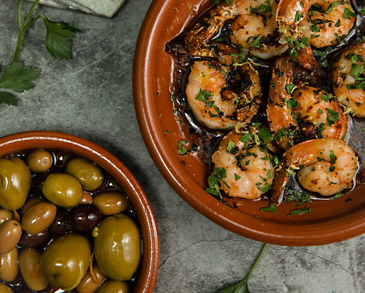 debajo new york olives and shrimp dish