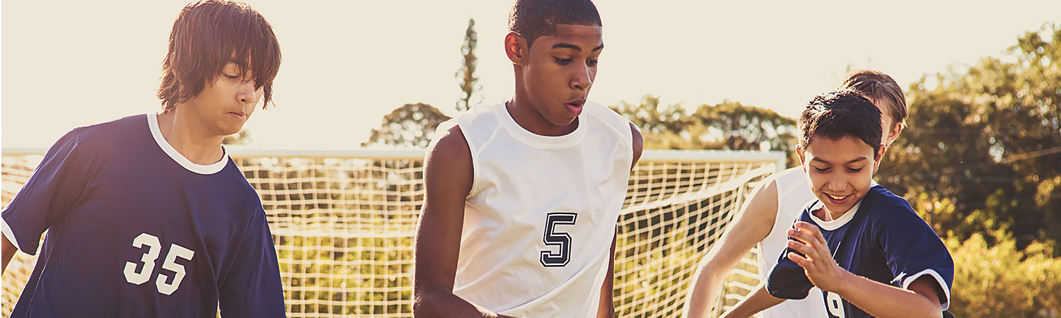 young boys playing soccer