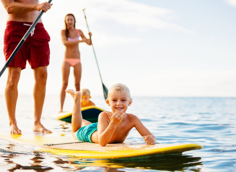 family standup paddle boarding
