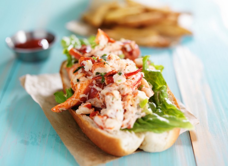 lobster roll on a wooden table