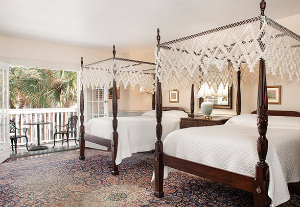 two beds in a spacious bedroom