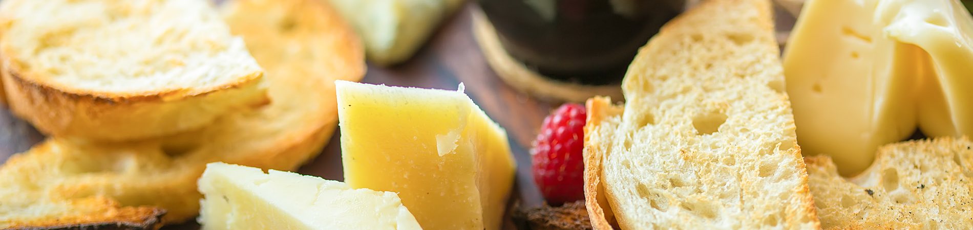 cheese  and fruit on a plate