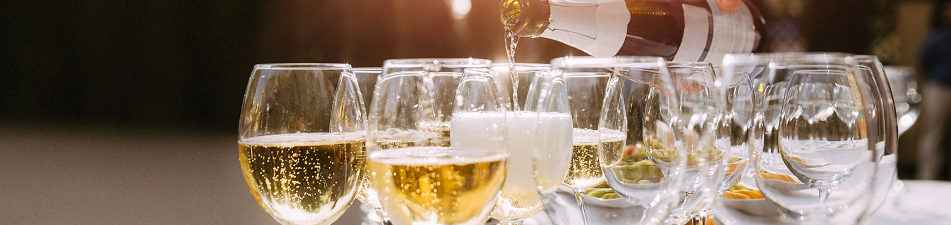 champagne being poured into glasses