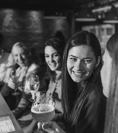 group of friends enjoying cocktails