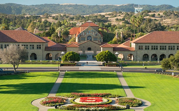 Stanford university grassy knoll with buildings