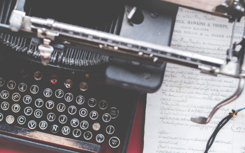 Vintage Typwriter on a red desk