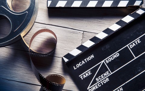 movie reel and clap board