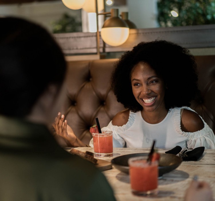 Couple at dinner with cocktails