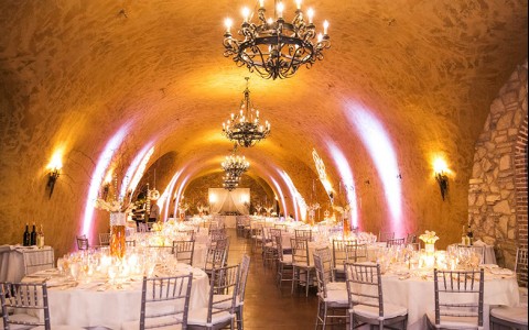 Wedding venue inside a cave with set up tables