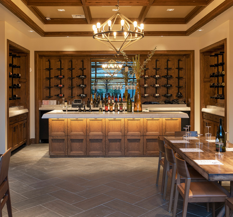 Wine cellar room with a bar and dining tables