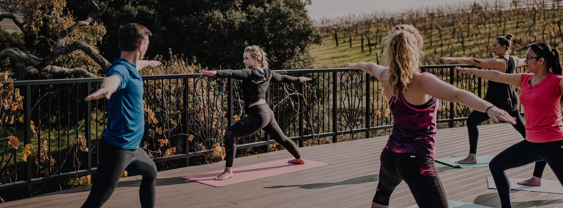 Group of women doing yoga on the terrace