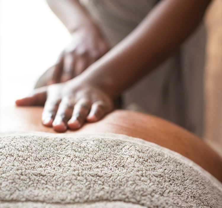 close-up view of a man getting soothing back massage