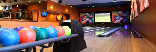 Crush Lounge bowling area with colorful bowling balls