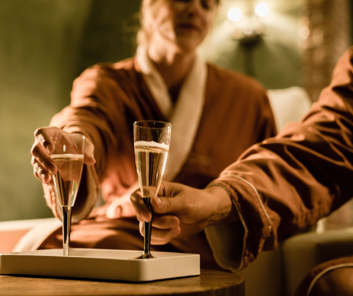 couple enjoying glass of champagne