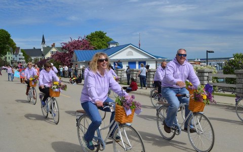 a group of people ridding bikes