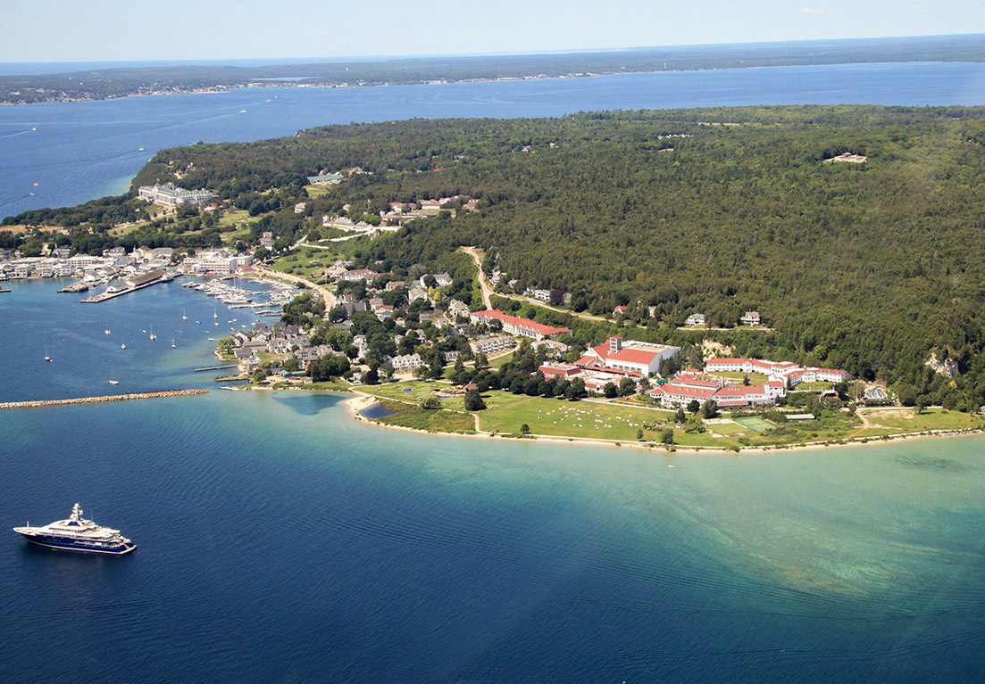 aerial view of the hotel surrounded by the sea