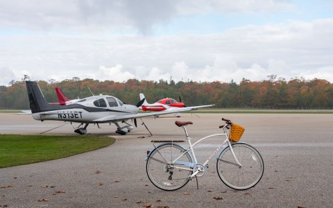 mission point bike in front of two planes
