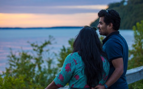 couple watching a view at sunset