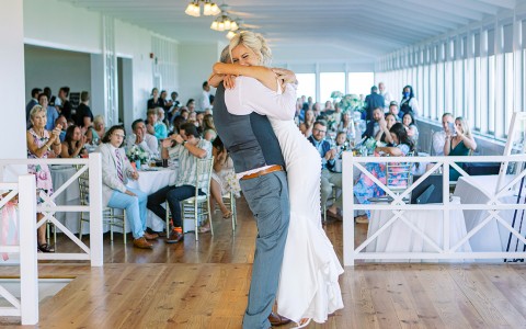  bride and groom hugging each other
