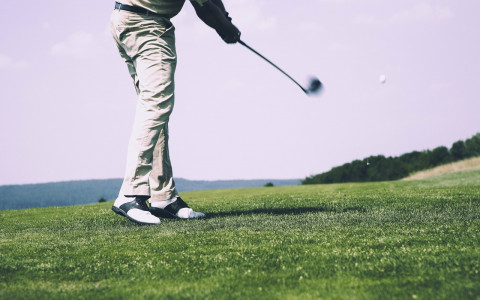 Man playing golf