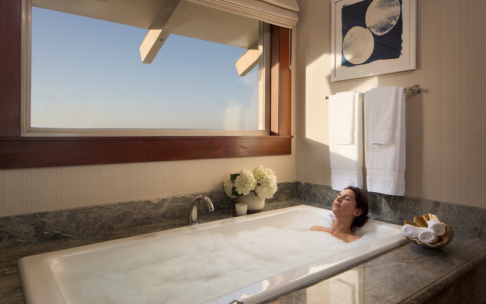 Order a bottle of bubbly to your room and sink into your private jacuzzi