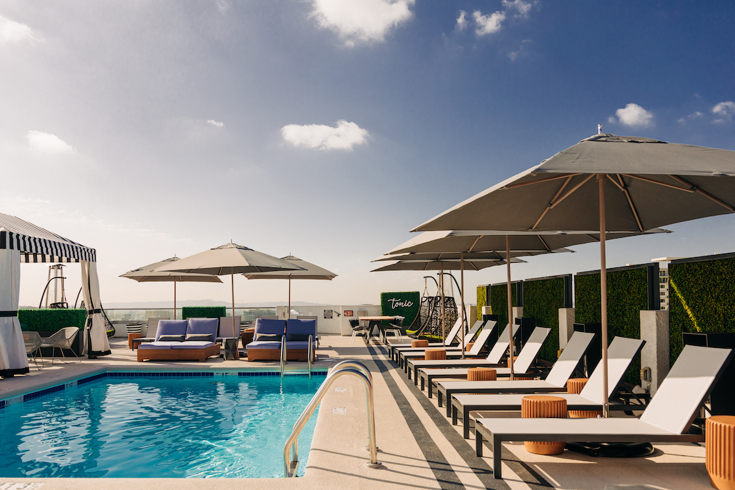 rooftop pool with cabanas and bar
